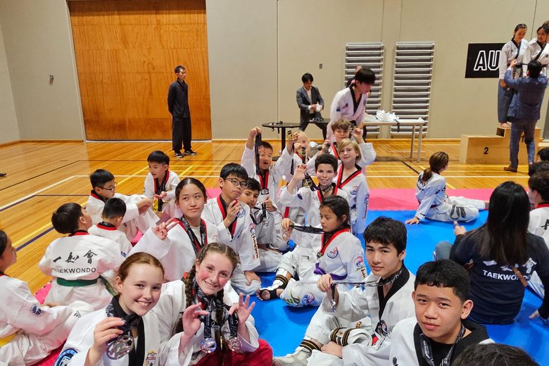 Students with competition medals